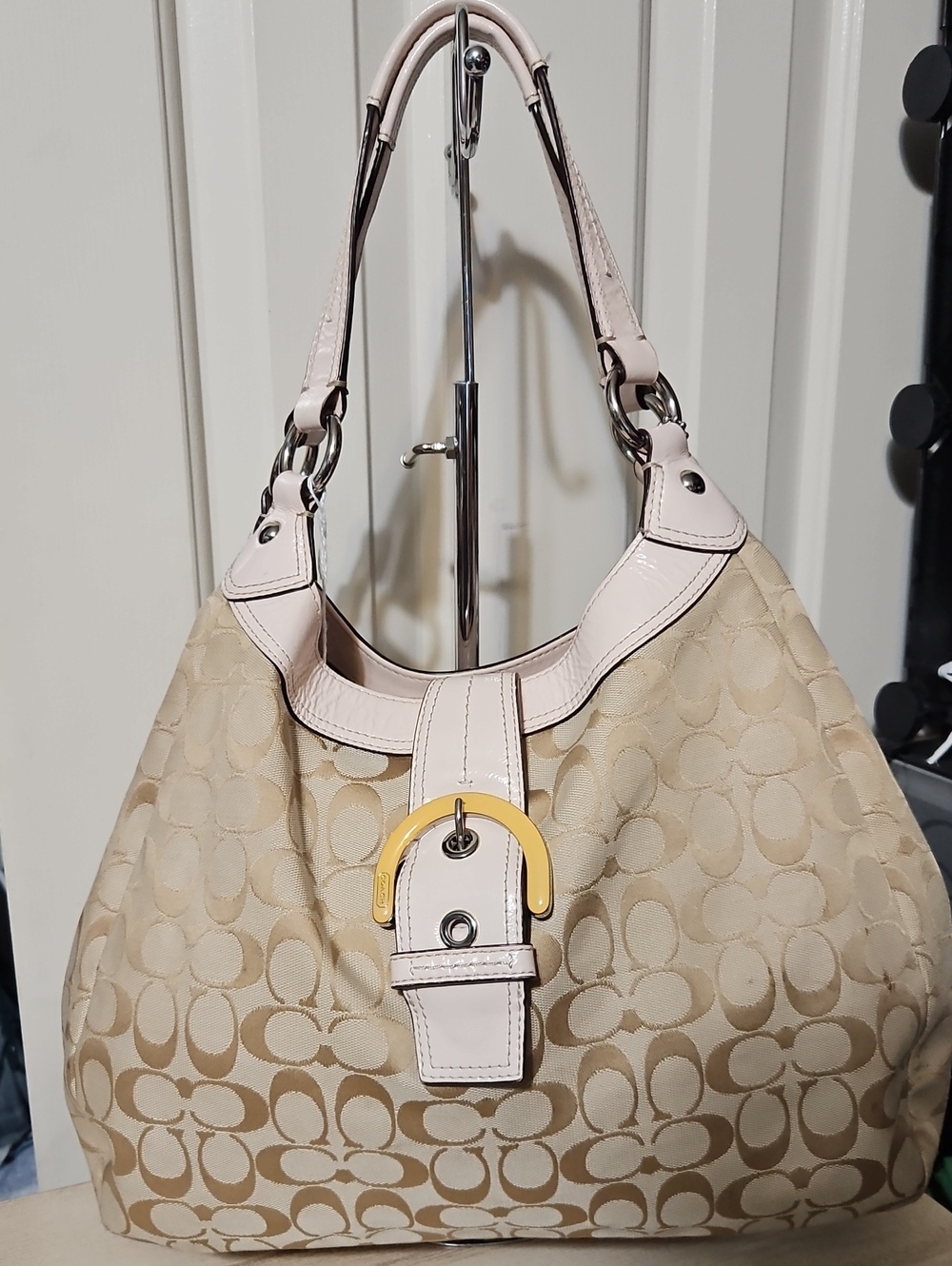CoachEUC Soho Beige Signature Canvas Hobo with Light Pink Trim and Yellow Buckle